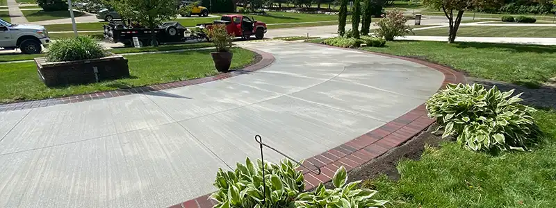 Poured Concrete with paver ribbons